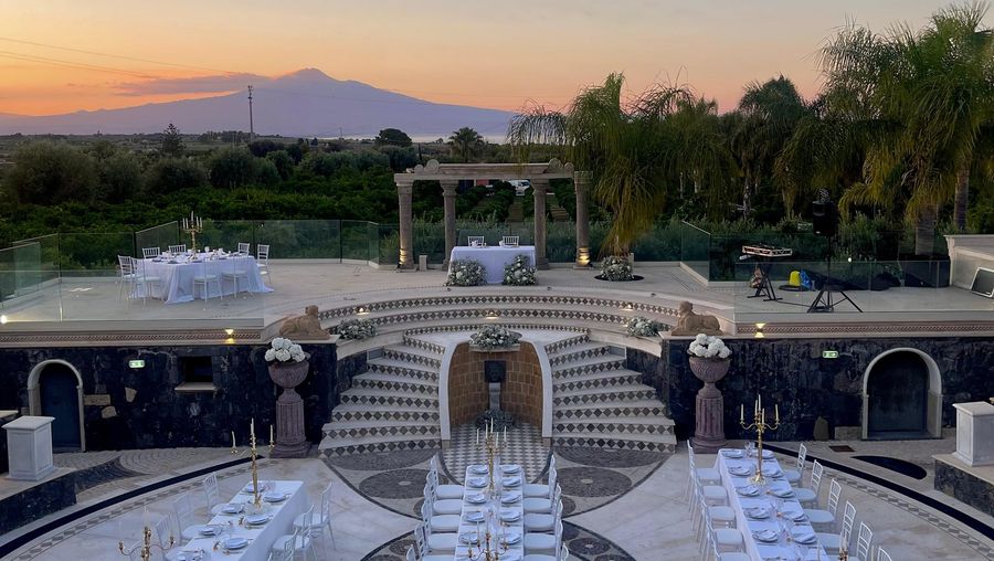 Citrus gardens and a stone amphitheatre at Thalos near Augusta, with Etna behind